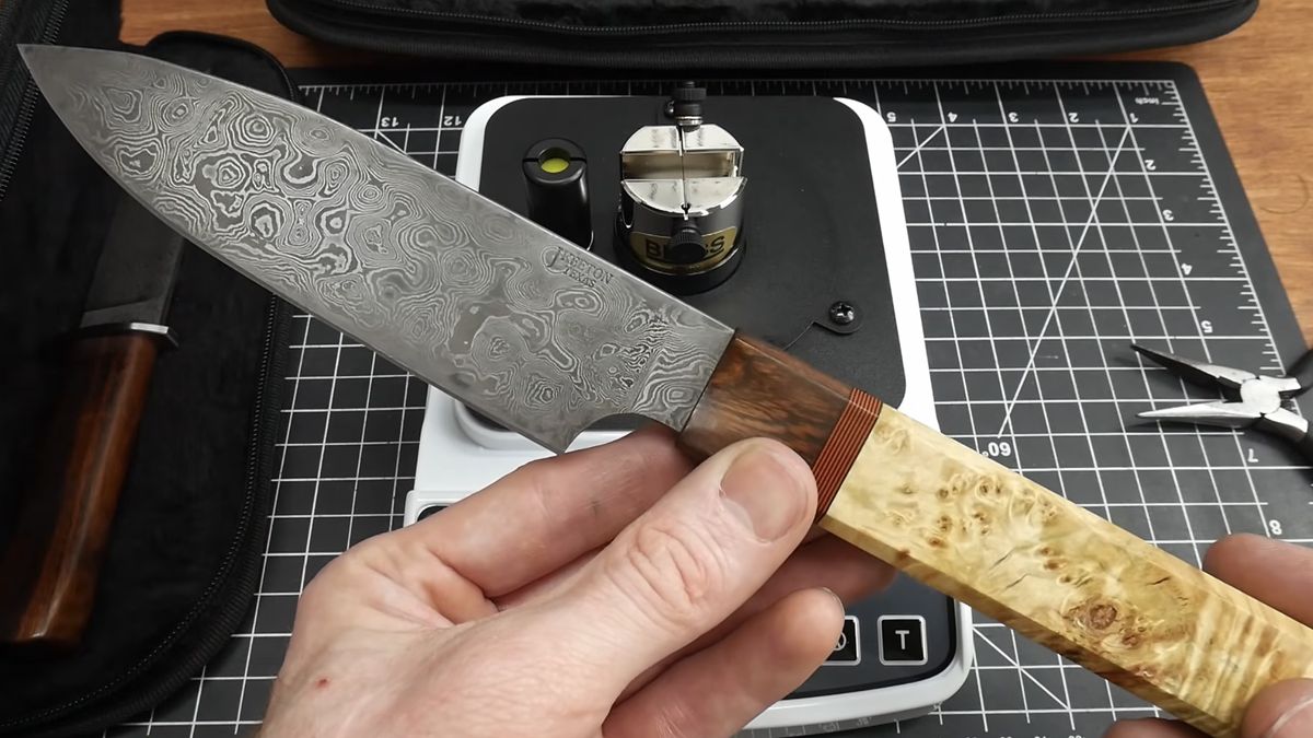 Sharpened Damascus chef knife on the bench